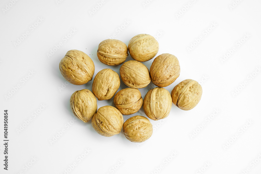 Ripe dry split walnut. Walnuts Isolated on White Background. closeup of shelled organic walnut halves. walnut, nut, full depth of field Ripe dry split walnut. Walnuts Isolated on White Background. closeup of shelled organic walnut halves. walnut, nut, full depth of field
