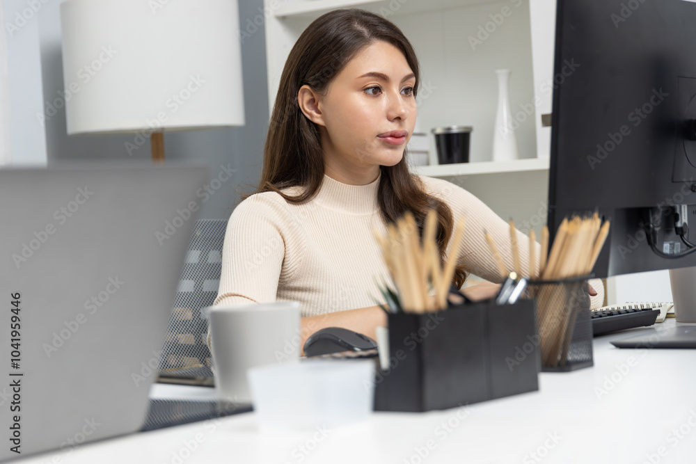 Casual outfit beautiful businesswoman searching research report on pc and writing note script to create marketing plan to analyze customer target with updated promotion at modern office. Postulate. Casual outfit beautiful businesswoman searching research report on pc and writing note script to create marketing plan to analyze customer target with updated promotion at modern office. Postulate.