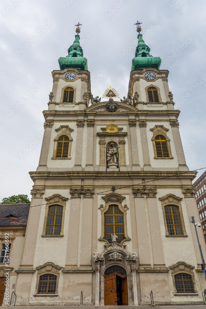 Baroque Twin Clock Towered Saint Anna Church in Buda Along Danube River in Budapest, Hungary. Baroque Twin Clock Towered Saint Anna Church in Buda Along Danube River in Budapest, Hungary.