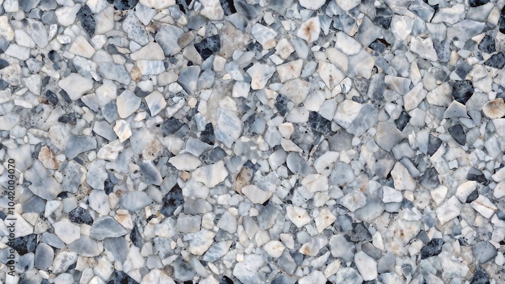 Close-up of textured gravel surface with gray, white, and blue stones creating a natural background Close-up of textured gravel surface with gray, white, and blue stones creating a natural background