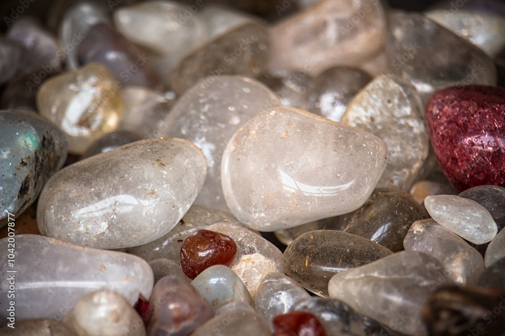several clear stones of different sizes several clear stones of different sizes