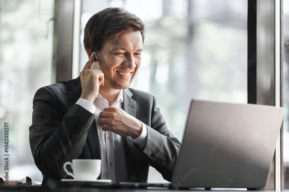 Portrait of a business person sitting in office Portrait of a business person sitting in office