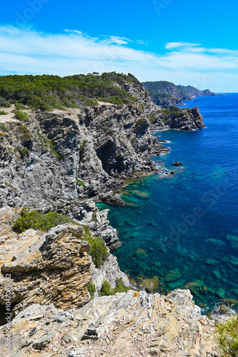 Sunny day on wild coast Porquerolles Island, Bluff and sea, France, High quality photo photo