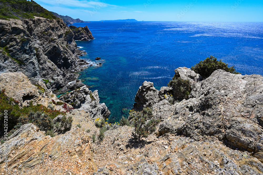 Sunny day on wild coast Porquerolles Island, Bluff and sea, France, High quality photo Sunny day on wild coast Porquerolles Island, Bluff and sea, France, High quality photo