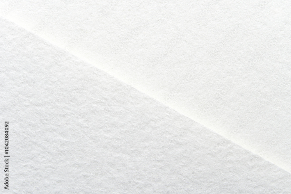 Obraz premium Minimalist white paper texture background for design projects and creative inspiration.