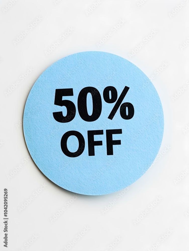 Black '50% OFF' Text on a Sky Blue Round Paper Note. White Background 
