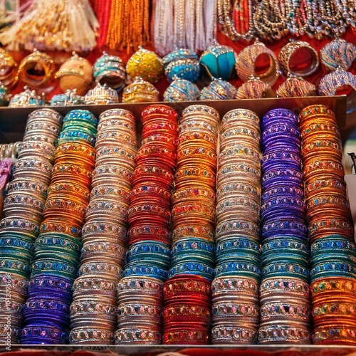 colorful traditional bangles displayed at a vibrant market during the festive season in india