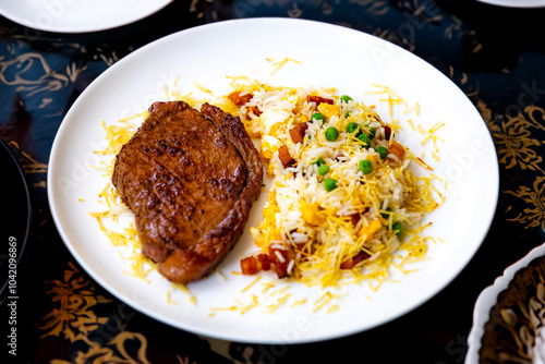 Authentic Brazilian food, grilled picanha steak with birobiro rice photo