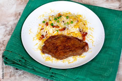 Authentic Brazilian food, grilled picanha steak with birobiro rice photo