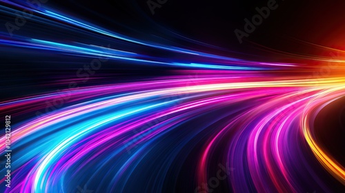 Colorful light trails illuminate a dark background, creating a dynamic and vibrant abstract composition.