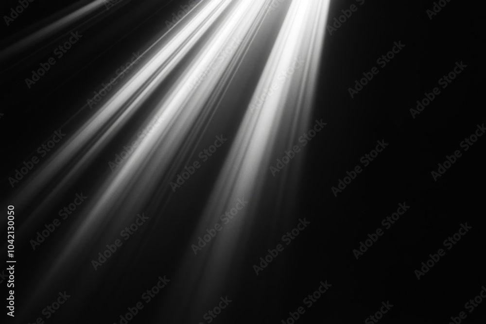 light striking through a dark background light striking through a dark background