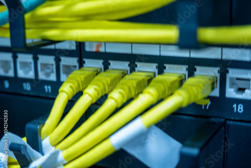 Detail shots of the server room. Firewall, fiber and RJ-45 cable image. Close-up Server. Cybersecurity and server concept. Fiber Internet, RJ45 Cable and detailed server images. photo