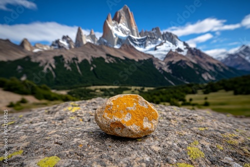 Hyper-realistic close-up of Monte Fitz Royâ€™s craggy granite face, capturing every crack and crevice in stunning detail, with light and shadow playing across the rock