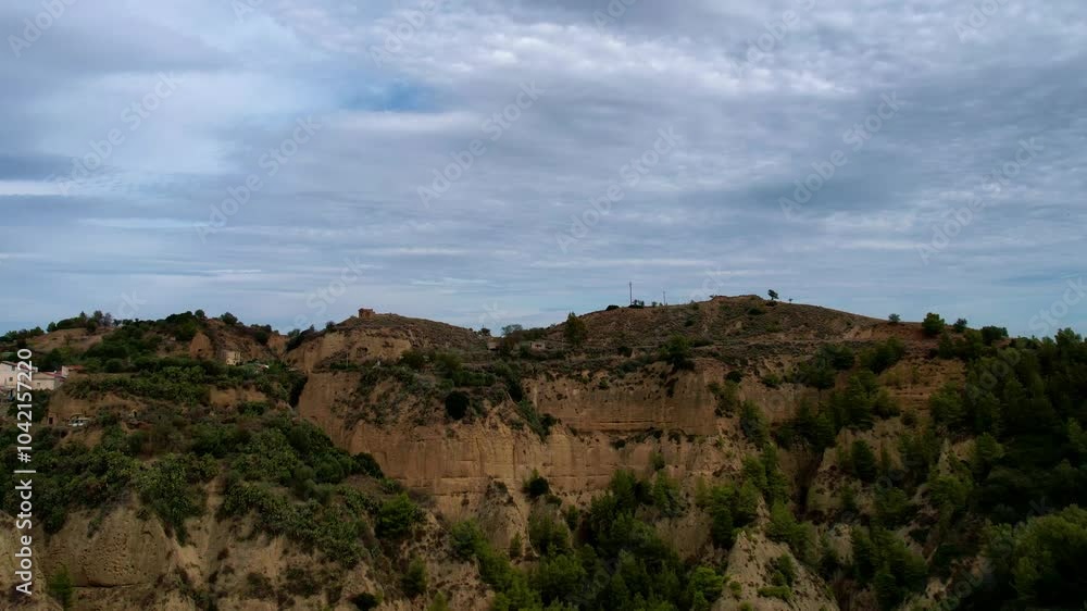 4K Aerial drone video of ancient town elevated in the hills with unreal cloud shapes with a mystical look. Abandoned ghost town Tursi in Italy outback with empty houses and streets 4K Aerial drone video of ancient town elevated in the hills with unreal cloud shapes with a mystical look. Abandoned ghost town Tursi in Italy outback with empty houses and streets