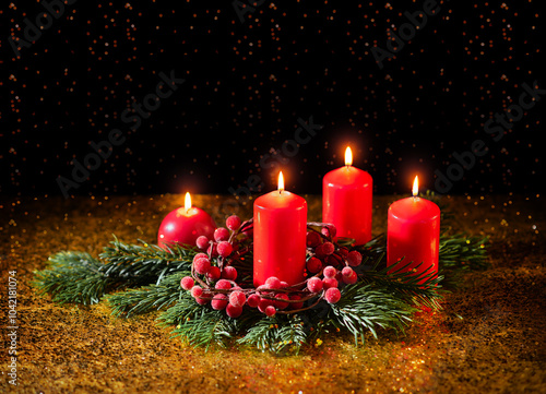 Obraz na płótnie Four red Christmas candles on a dark background w salonie