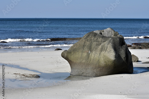 Large stones on the shore of the North Sea photo