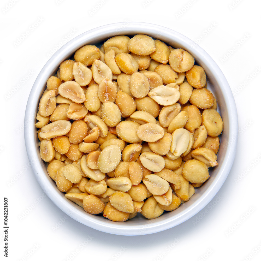 Salted peanuts in round container on white background Salted peanuts in round container on white background