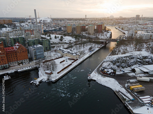 Canvas Print Aerial drone Landscape of colorful riverfront buildings during winter sunset Cen
