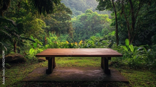 A wooden table in a lush green forest surrounded by tropical trees and plants...