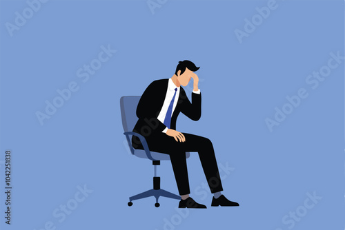 A businessman sits in an office chair, head in hand, expressing regret and frustration.