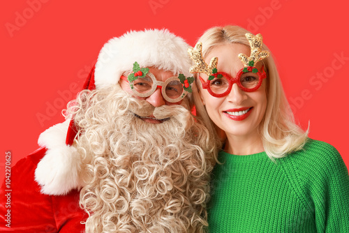 Santa Claus and beautiful m...