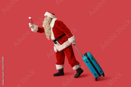 Santa Claus with suitcase, ...