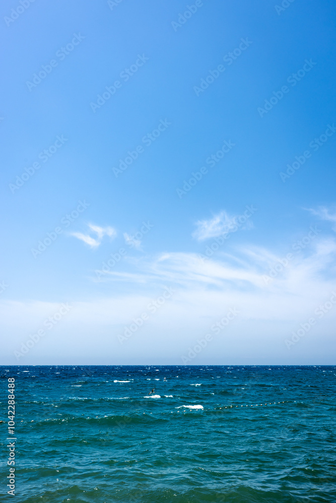 Serene Ocean Horizon with Clear Blue Sky Serene Ocean Horizon with Clear Blue Sky