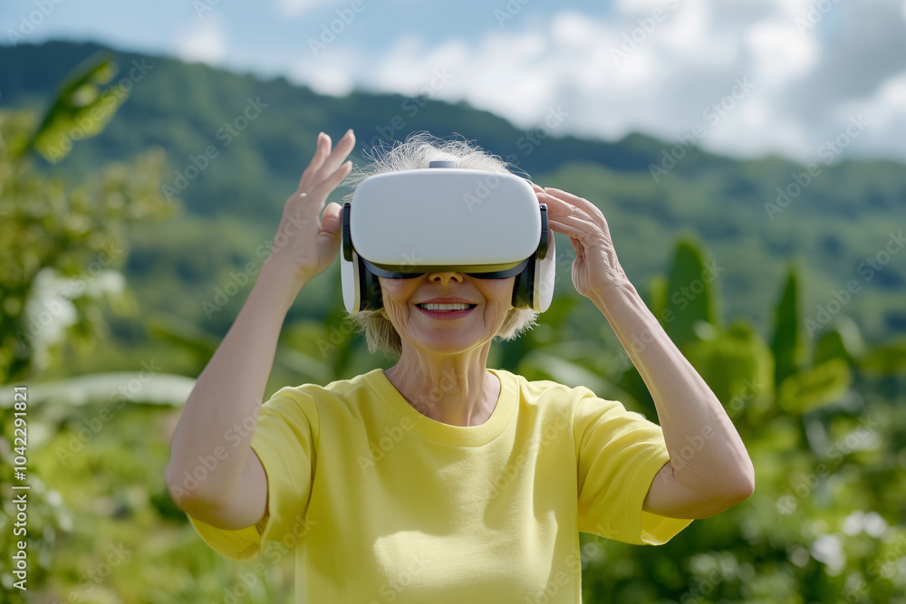 Senior enthusiast exploring virtual reality outdoors in a lush setting Senior enthusiast exploring virtual reality outdoors in a lush setting
