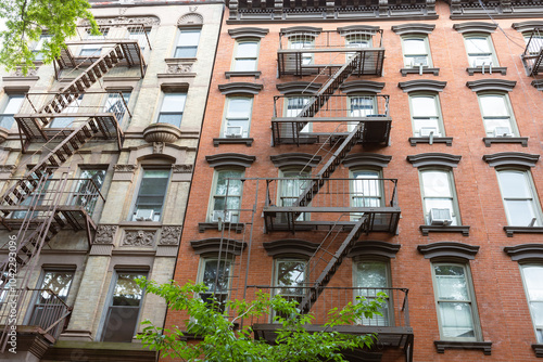 Historic Red Brick Building with Fire Escape photo