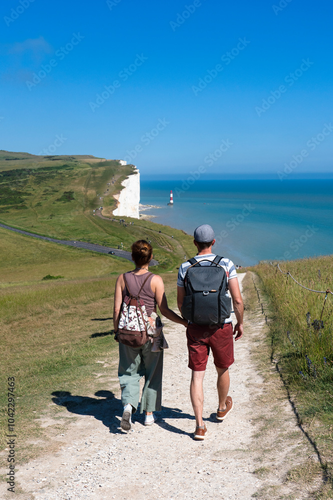 Couple hiking at Seven Sisters, East Sussex