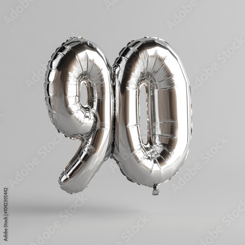 Silver balloon shaped like number 90 photo