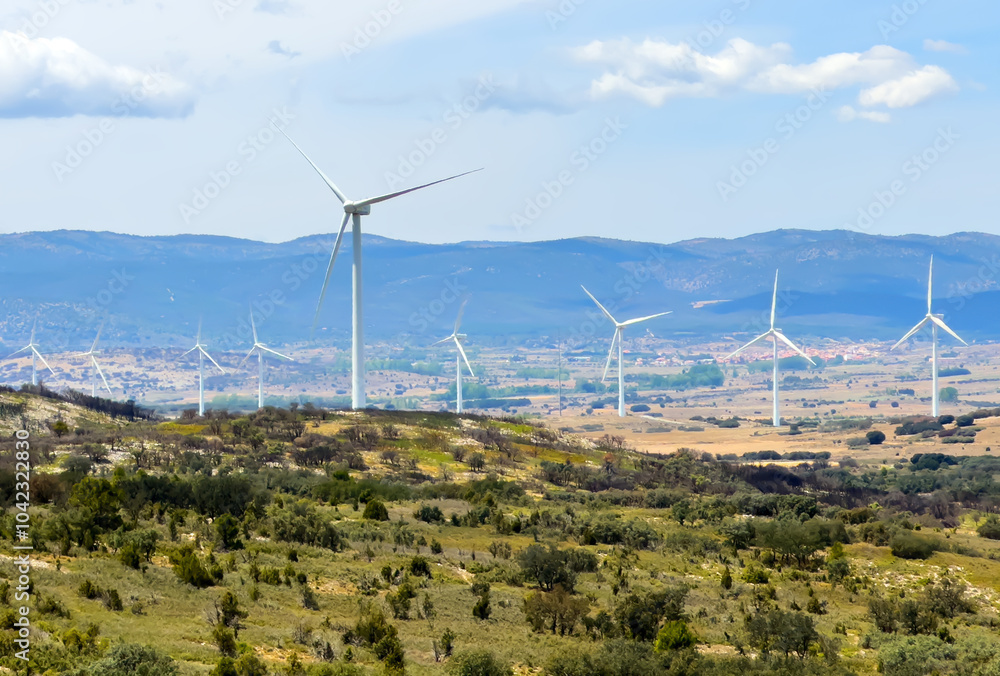 Wind farm, Wind energy, electricity. Wind turbine in mountains. Eolic park windpower. Wind turbines alternative energy. Windmill power, electricity generation in Viver, Castellón, Caudiel, Spain Wind farm, Wind energy, electricity. Wind turbine in mountains. Eolic park windpower. Wind turbines alternative energy. Windmill power, electricity generation in Viver, Castellón, Caudiel, Spain