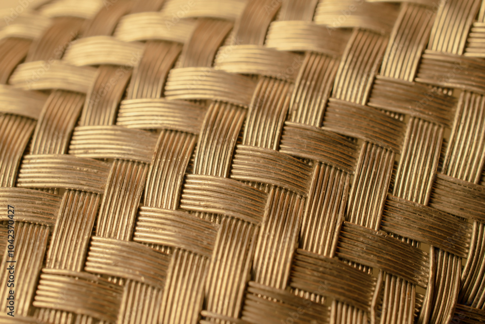 Obraz premium wire mesh woven gold background or texture