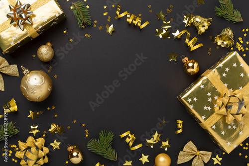 Christmas decor, gift boxes and confetti on color background, top view. Copy space for design