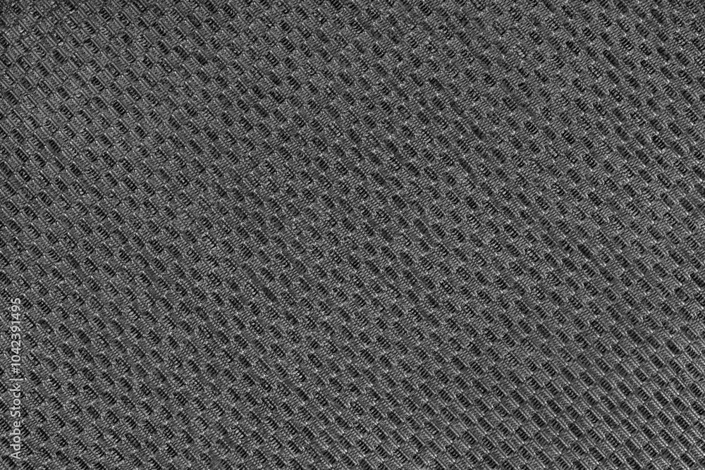Texture of black jacquard fabric of diagonal rough weave macro, close up. Material for home textile, upholstery and curtain decor, garment. Background, wallpaper, backdrop. Texture of black jacquard fabric of diagonal rough weave macro, close up. Material for home textile, upholstery and curtain decor, garment. Background, wallpaper, backdrop.