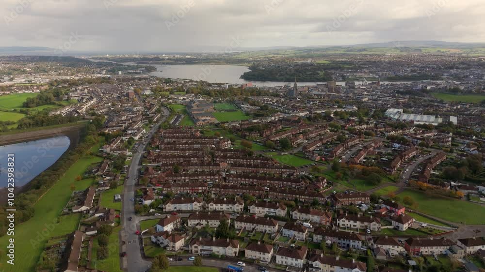 City of Derry aka Londonderry in Northern Ireland aerial view - A Beautiful Cityscape from above by the River Foyle Featuring the Beautiful Pedestrian Peace Bridge City of Derry aka Londonderry in Northern Ireland aerial view - A Beautiful Cityscape from above by the River Foyle Featuring the Beautiful Pedestrian Peace Bridge