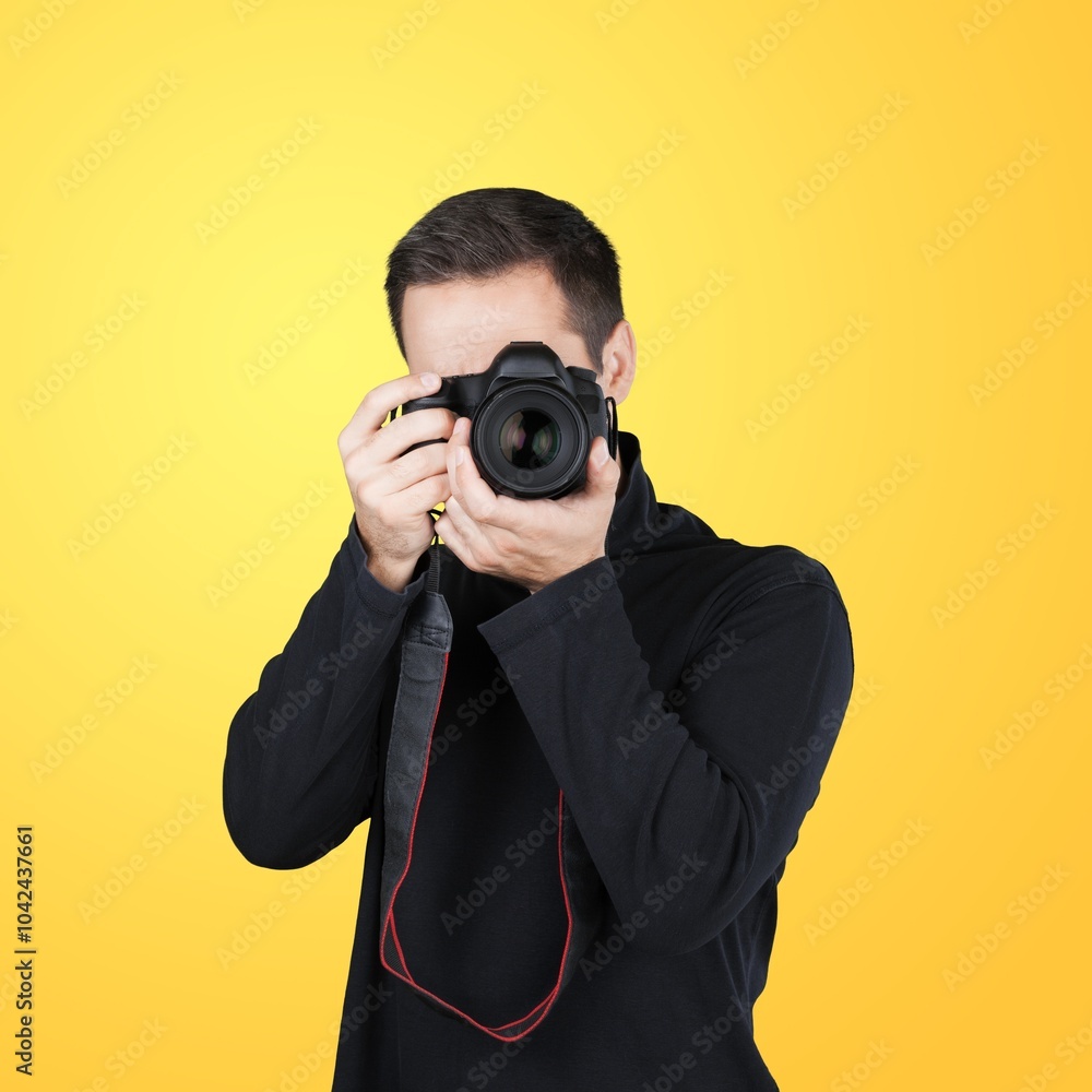 Human hands of photographer with camera on color background Human hands of photographer with camera on color background