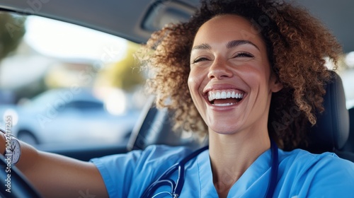 A happy medical nurse in blue scrubs, smiling joyfully while sitting in a car, exuding positivity and commitment to her profession in healthcare. photo