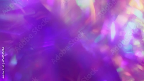 A holographic rainbow iridescent neon purple pink teal blue colors abstract background