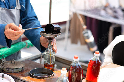 Street vendors selling sesame oil photo