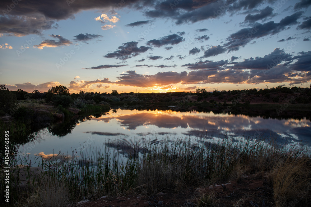 Fototapeta premium Sunset over the lake in Utah summer with clouds