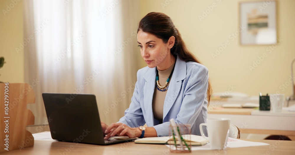 Laptop, serious and business woman typing in office for research, creative blog and copywriting. Computer, mature manager and writing email, feedback or review report for content writer at startup Laptop, serious and business woman typing in office for research, creative blog and copywriting. Computer, mature manager and writing email, feedback or review report for content writer at startup