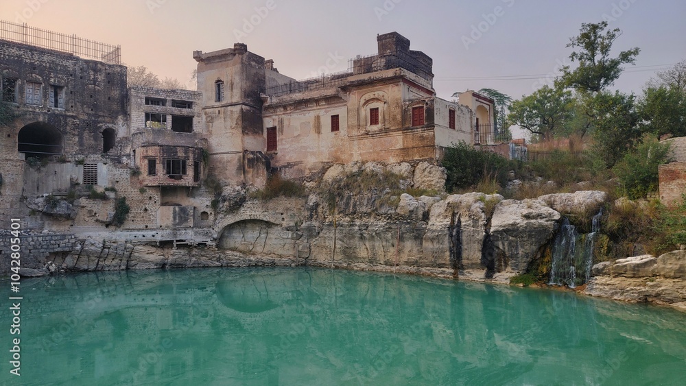 View of old temple and green pond at Katas Raj
