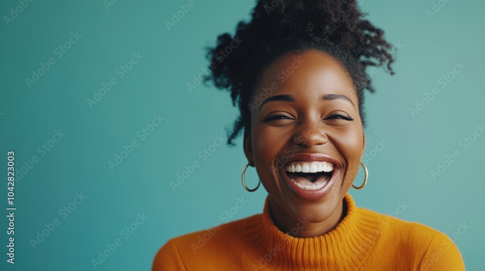 Smiling woman with curly hair, bright orange sweater, joyful expression Smiling woman with curly hair, bright orange sweater, joyful expression