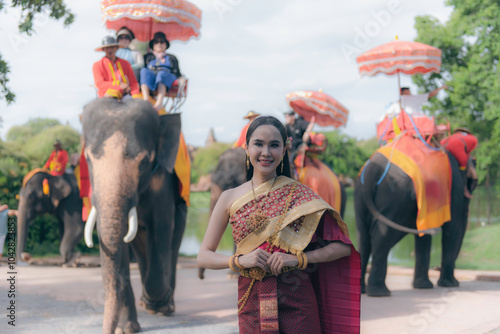 women in traditional clothing on Buddhist on background. Portrait women in traditional clothing , Thai traditional in Ayutthaya, Thailand.