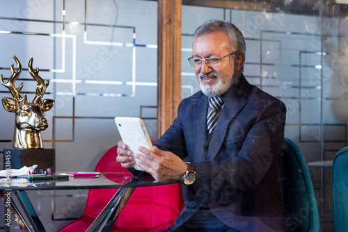 Photography Businessman using digital tablet at office