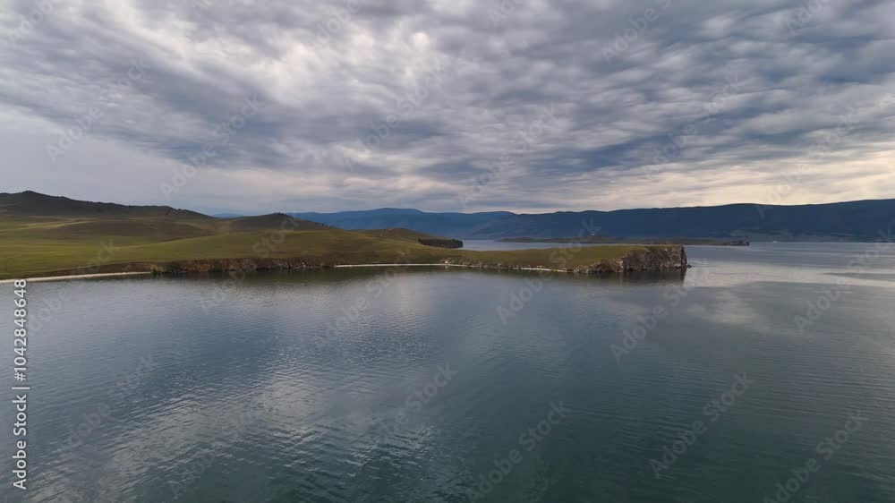 drone flight over the shore of Lake Baikal at sunset drone flight over the shore of Lake Baikal at sunset