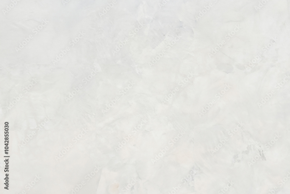 Close-up of a light, textured plaster wall with subtle patterns and an abstract design, ideal for backgrounds. Close-up of a light, textured plaster wall with subtle patterns and an abstract design, ideal for backgrounds.