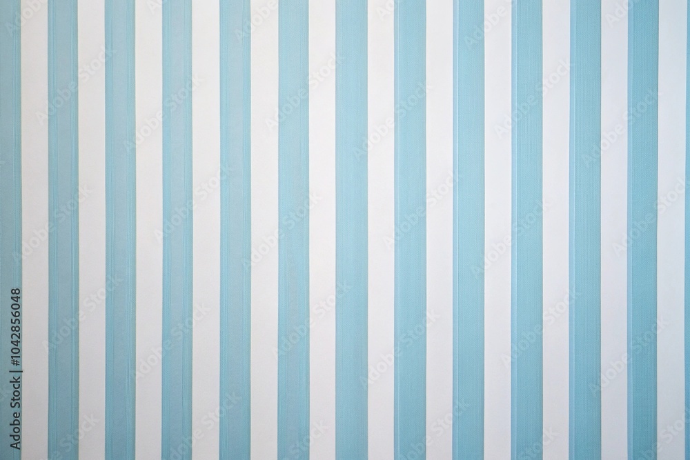 Light blue and white vertical striped wallpaper pattern Background Low Angle Light blue and white vertical striped wallpaper pattern Background Low Angle