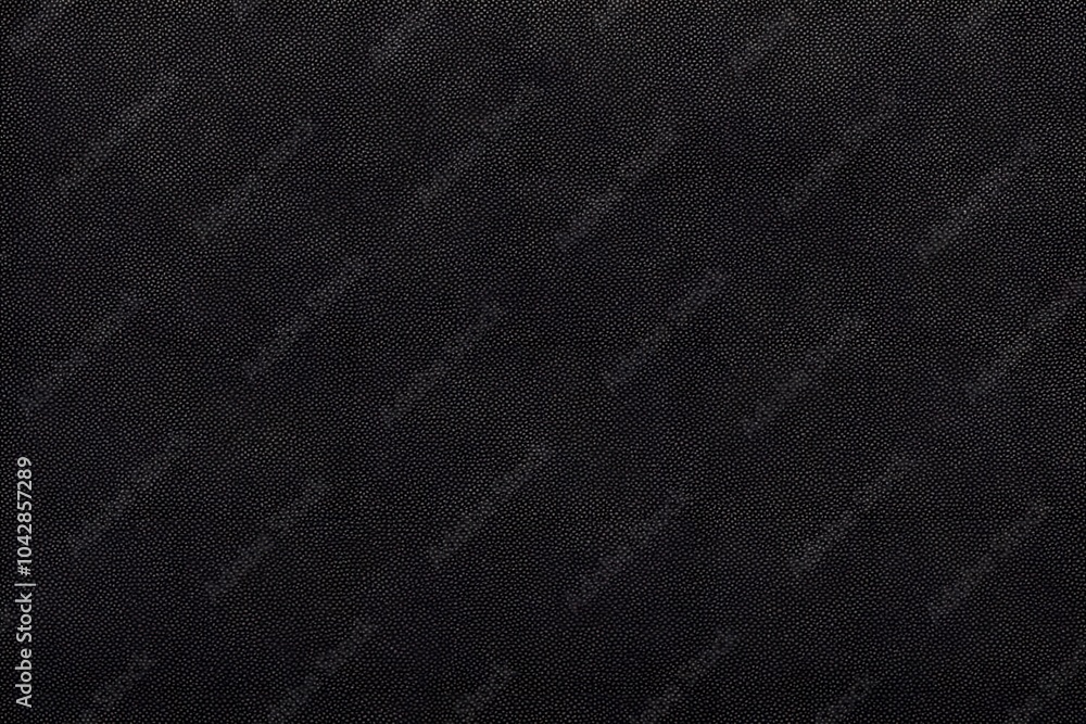 Fototapeta premium Rough and worn denim fabric in a deep black wash with subtle texture, Ai Generated